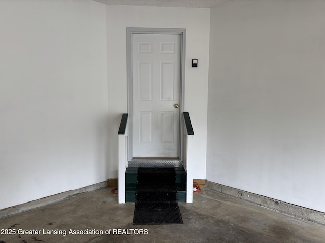 411 White Pine Blvd Unit 34, Lansing, MI 48917 - staircase with concrete floors