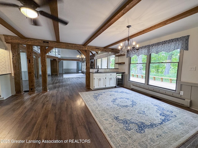 12855 Oneida Woods Trl, Grand Ledge, MI 48837 - dining area with a baseboard radiator, a chandelier, dark wood-style flooring, beverage cooler, and beamed ceiling