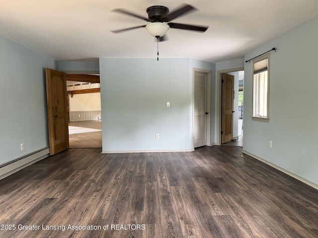 12855 Oneida Woods Trl, Grand Ledge, MI 48837 - empty room featuring ceiling fan, wood finished floors, a baseboard heating unit, and baseboards