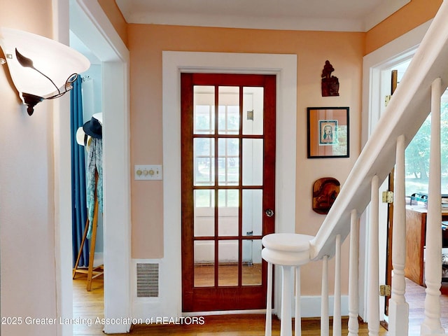 627 State St, Eaton Rapids, MI 48827 - entrance foyer featuring wood finished floors