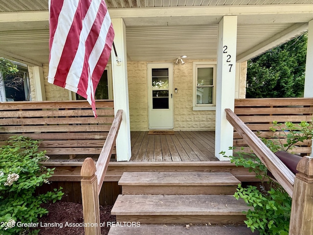 227 S Foster Ave, Lansing, MI 48912 - doorway to property with a porch