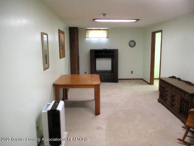 4818 Moultrie Cir, Lansing, MI 48917 - living area featuring light colored carpet