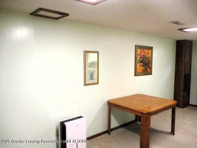 4818 Moultrie Cir, Lansing, MI 48917 - office featuring light colored carpet and baseboards