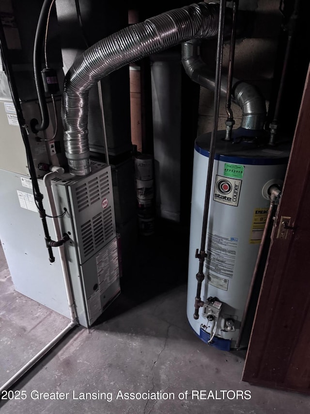 603 Armstrong Rd, Lansing, MI 48911 - utilities featuring water heater and heating unit