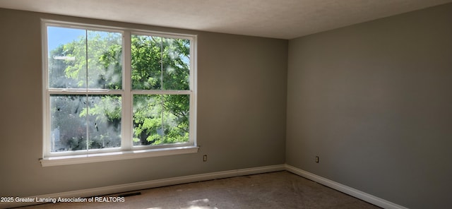 7822 Forestview Dr, Haslett, MI 48840 - spare room with plenty of natural light