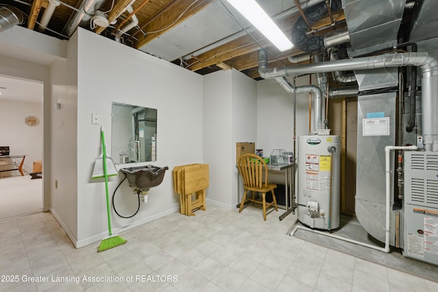 1703 Willow Creek Dr Unit 29, Lansing, MI 48917 - utility room featuring water heater