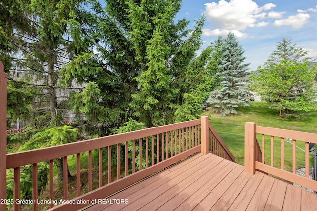 1703 Willow Creek Dr Unit 29, Lansing, MI 48917 - wooden terrace featuring a lawn
