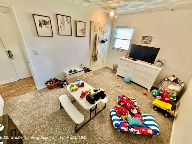 3130 Delta River Dr, Lansing, MI 48906 - game room featuring carpet flooring and baseboards