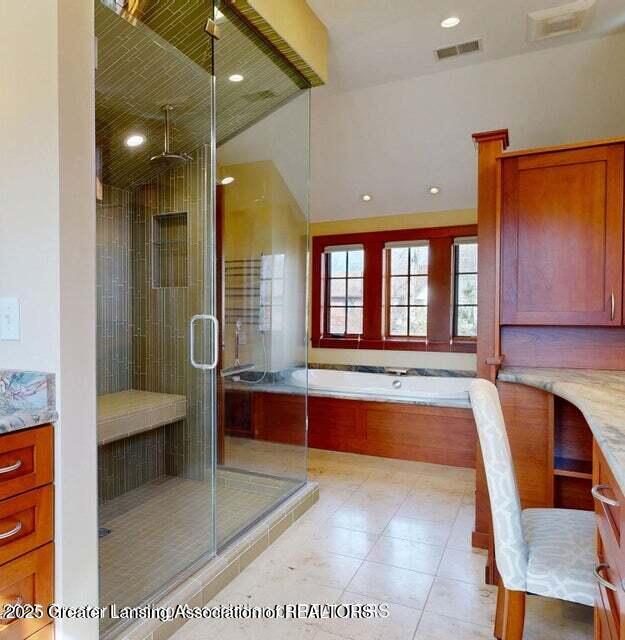 1046 Cresenwood Rd, East Lansing, MI 48823 - bathroom featuring a shower stall, a bath, vanity, tile patterned floors, and recessed lighting