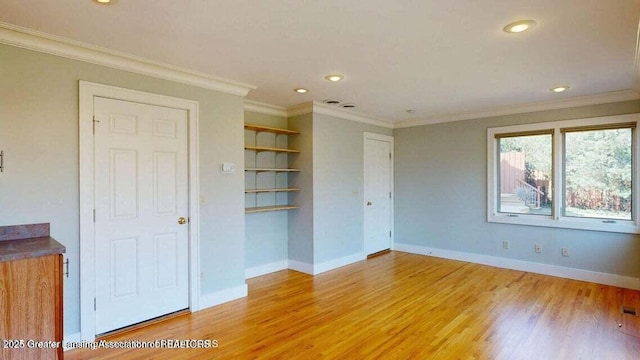 1046 Cresenwood Rd, East Lansing, MI 48823 - unfurnished room with light wood-style floors, recessed lighting, and crown molding