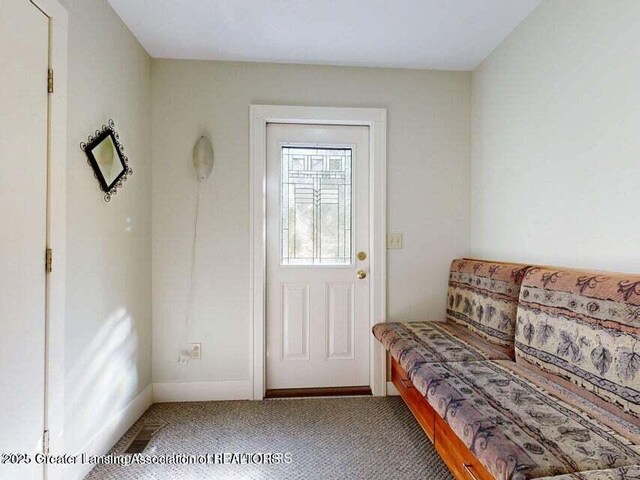 1046 Cresenwood Rd, East Lansing, MI 48823 - entryway with carpet floors and baseboards