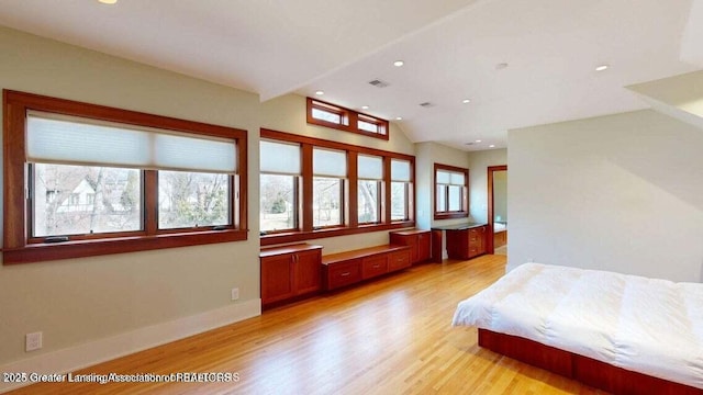 1046 Cresenwood Rd, East Lansing, MI 48823 - bedroom featuring light wood-type flooring, vaulted ceiling, and recessed lighting