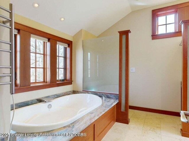 1046 Cresenwood Rd, East Lansing, MI 48823 - full bath featuring healthy amount of natural light, a bath, lofted ceiling, and recessed lighting