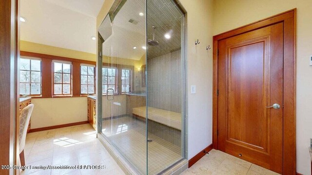 1046 Cresenwood Rd, East Lansing, MI 48823 - full bathroom featuring a stall shower and recessed lighting