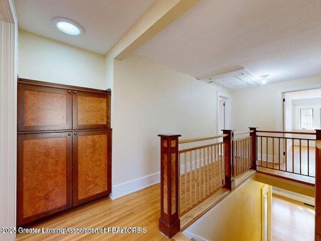 1046 Cresenwood Rd, East Lansing, MI 48823 - hall with an upstairs landing and light wood finished floors