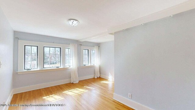 1046 Cresenwood Rd, East Lansing, MI 48823 - unfurnished room featuring wood finished floors