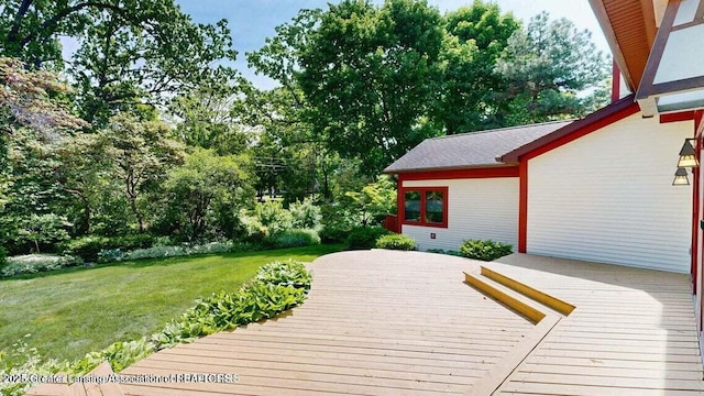 1046 Cresenwood Rd, East Lansing, MI 48823 - deck with a yard and view of wooded area