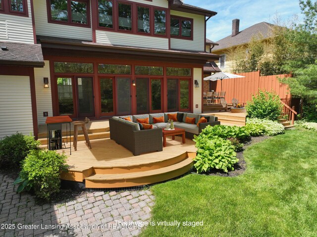 1046 Cresenwood Rd, East Lansing, MI 48823 - back of property with an outdoor living space, a wooden deck, and a lawn