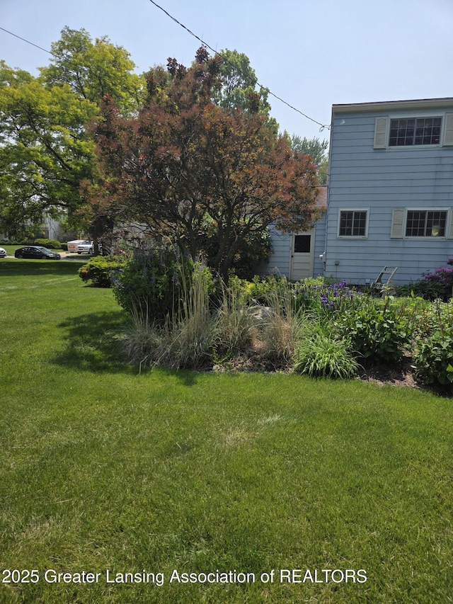 2115 Lyman Dr, Lansing, MI 48912 - view of green lawn