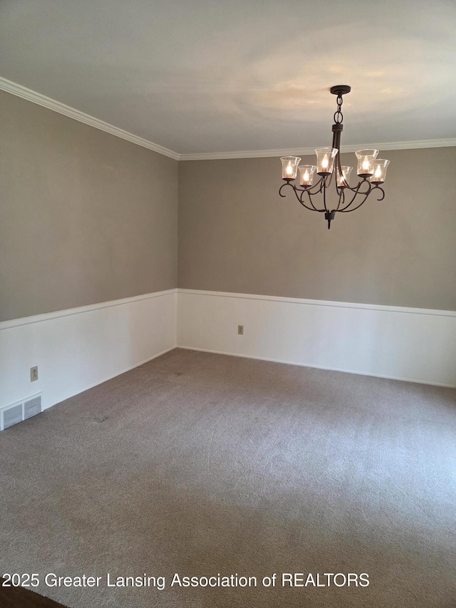 2115 Lyman Dr, Lansing, MI 48912 - carpeted empty room featuring a chandelier and crown molding