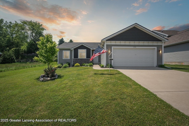 14192 Mulholland Dr, Bath, MI 48808 - view of front facade with driveway, an attached garage, a front lawn, and stone siding