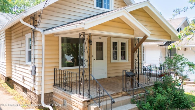 523 N Fairview Ave, Lansing, MI 48912 - entrance to property featuring covered porch and roof with shingles