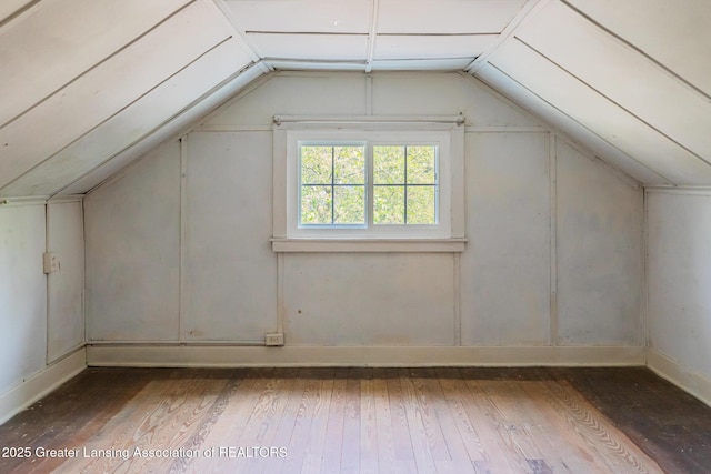 523 N Fairview Ave, Lansing, MI 48912 - bonus room featuring lofted ceiling, hardwood / wood-style floors, and baseboards