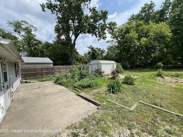 4219 Richmond St, Lansing, MI 48911 - view of yard featuring a patio area and view of scattered trees