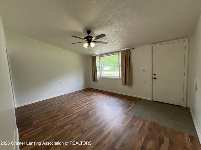 4219 Richmond St, Lansing, MI 48911 - unfurnished room with wood finished floors, a ceiling fan, a textured ceiling, and baseboards