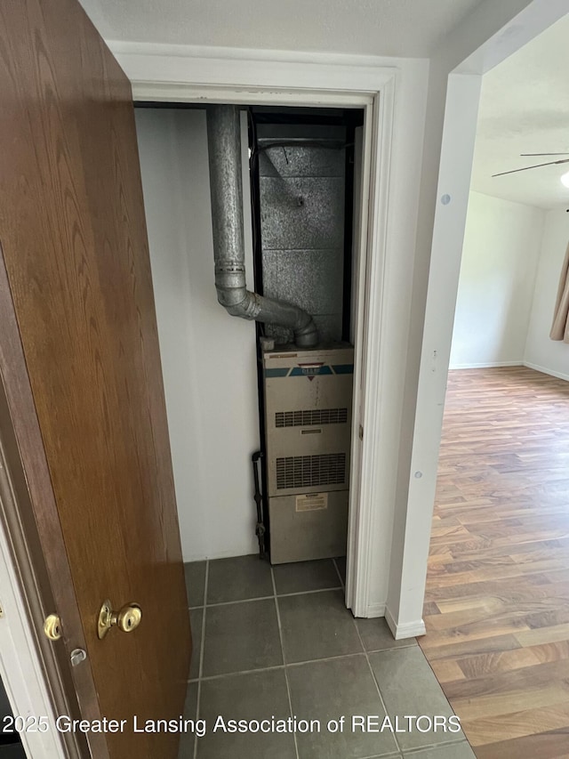 4219 Richmond St, Lansing, MI 48911 - detailed view of ceiling fan and wood finished floors