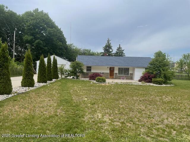 4022 Stabler St, Lansing, MI 48910 - view of front of home with a front lawn