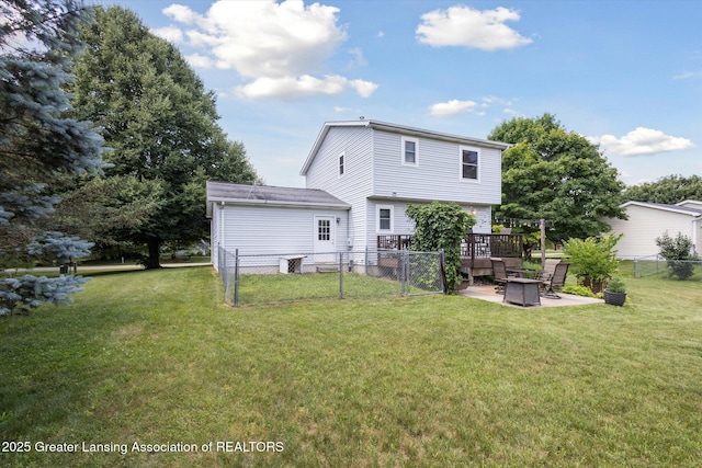 202 Kerry St, Eaton Rapids, MI 48827 - back of house featuring a patio area and an outdoor fire pit