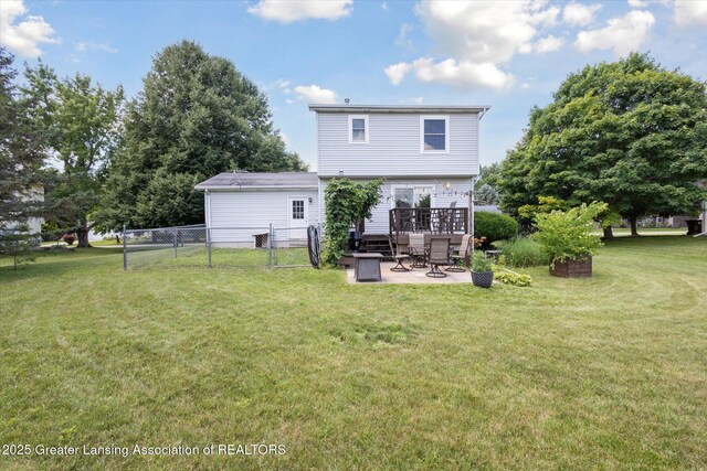 202 Kerry St, Eaton Rapids, MI 48827 - back of property with a patio area and a gate