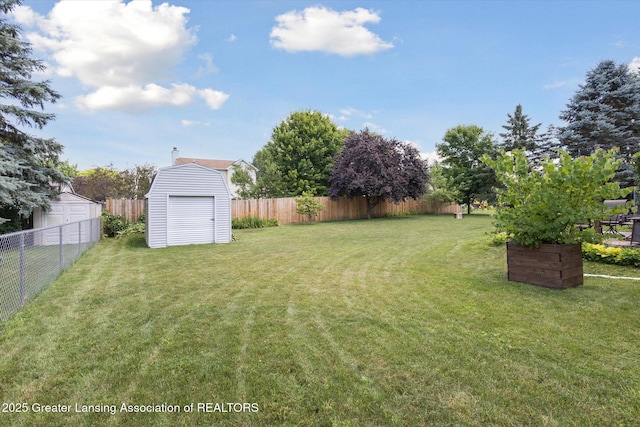 202 Kerry St, Eaton Rapids, MI 48827 - fenced backyard featuring a storage unit