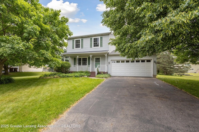 202 Kerry St, Eaton Rapids, MI 48827 - traditional-style home featuring driveway, a porch, and a front yard