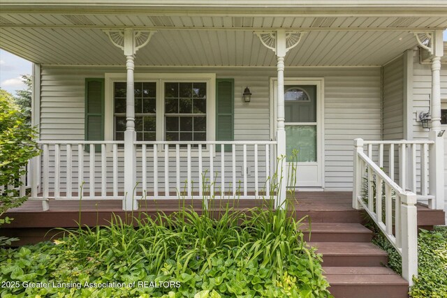 202 Kerry St, Eaton Rapids, MI 48827 - entrance to property featuring covered porch