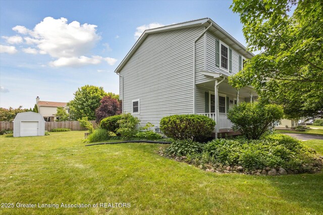 202 Kerry St, Eaton Rapids, MI 48827 - view of side of property with covered porch and a shed