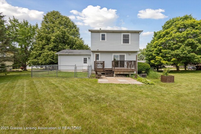 202 Kerry St, Eaton Rapids, MI 48827 - rear view of property featuring a wooden deck, a patio, and a gate