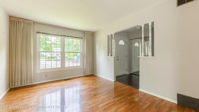 1965 Rutgers Cir, East Lansing, MI 48823 - unfurnished room featuring wood finished floors and baseboards