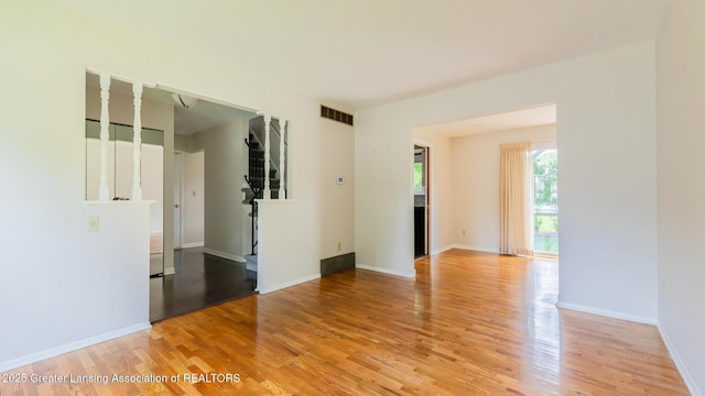 1965 Rutgers Cir, East Lansing, MI 48823 - spare room with light wood-style floors