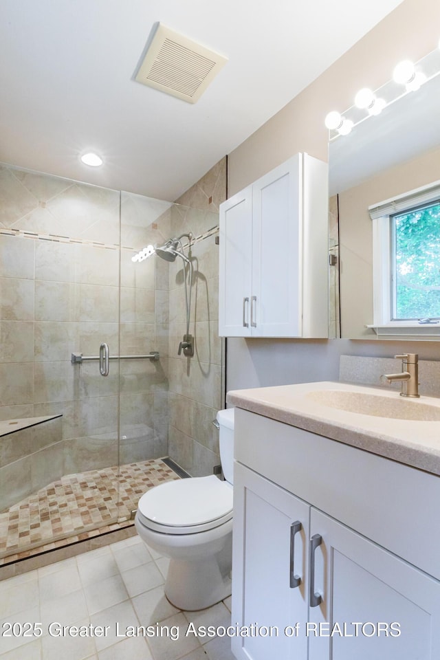 1965 Rutgers Cir, East Lansing, MI 48823 - full bath with vanity, a shower stall, tile patterned floors, and recessed lighting