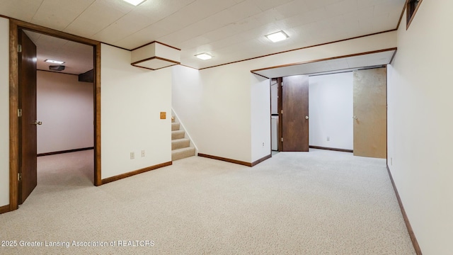 1965 Rutgers Cir, East Lansing, MI 48823 - finished below grade area featuring carpet flooring and stairway