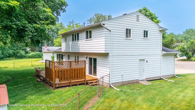 1965 Rutgers Cir, East Lansing, MI 48823 - back of property with a deck