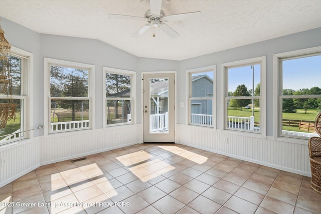 921 Ives Rd, Mason, MI 48854 - unfurnished sunroom with ceiling fan, tile patterned flooring, and vaulted ceiling