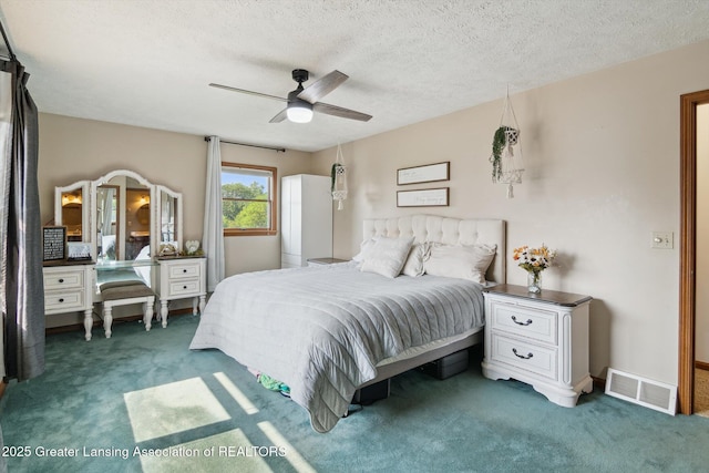 921 Ives Rd, Mason, MI 48854 - bedroom with carpet floors, a textured ceiling, and a ceiling fan