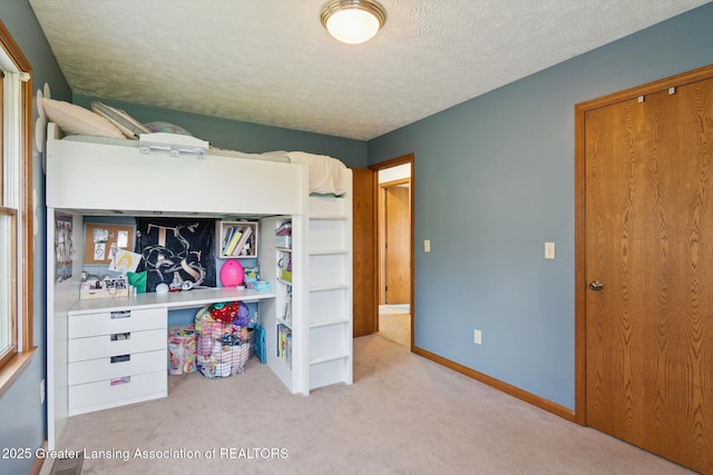 921 Ives Rd, Mason, MI 48854 - bedroom with carpet flooring and a textured ceiling