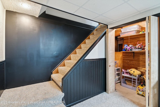 921 Ives Rd, Mason, MI 48854 - staircase with carpet flooring