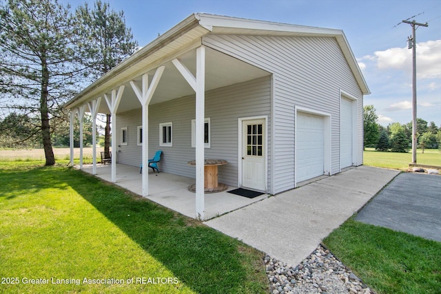 921 Ives Rd, Mason, MI 48854 - exterior space with a detached garage