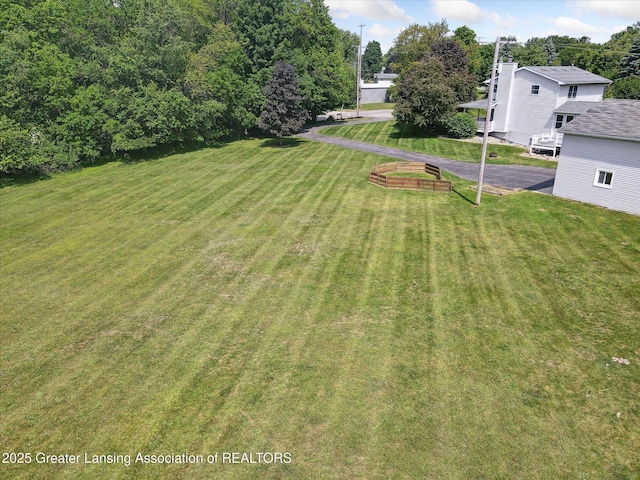 921 Ives Rd, Mason, MI 48854 - view of green lawn