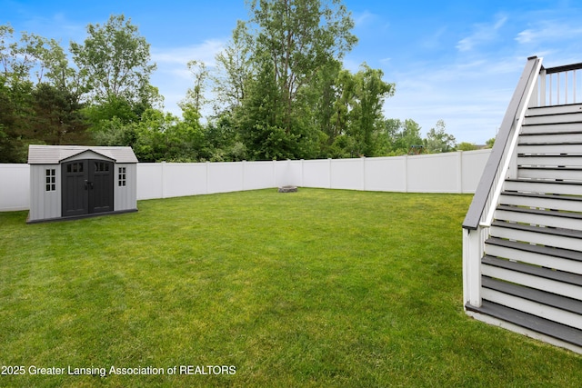 15925 Turnberry St, Lansing, MI 48906 - fenced backyard featuring stairway and a shed